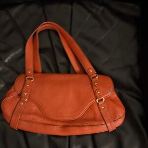 Elegant Orange Leather Handbag with leather straps